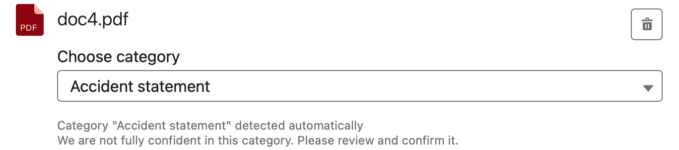 File row with a preselected category and a warning to review and confirm it